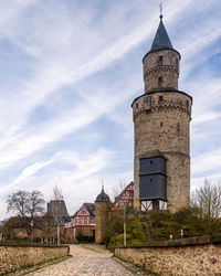 Low angle view of hexenturm against sky in idstein
