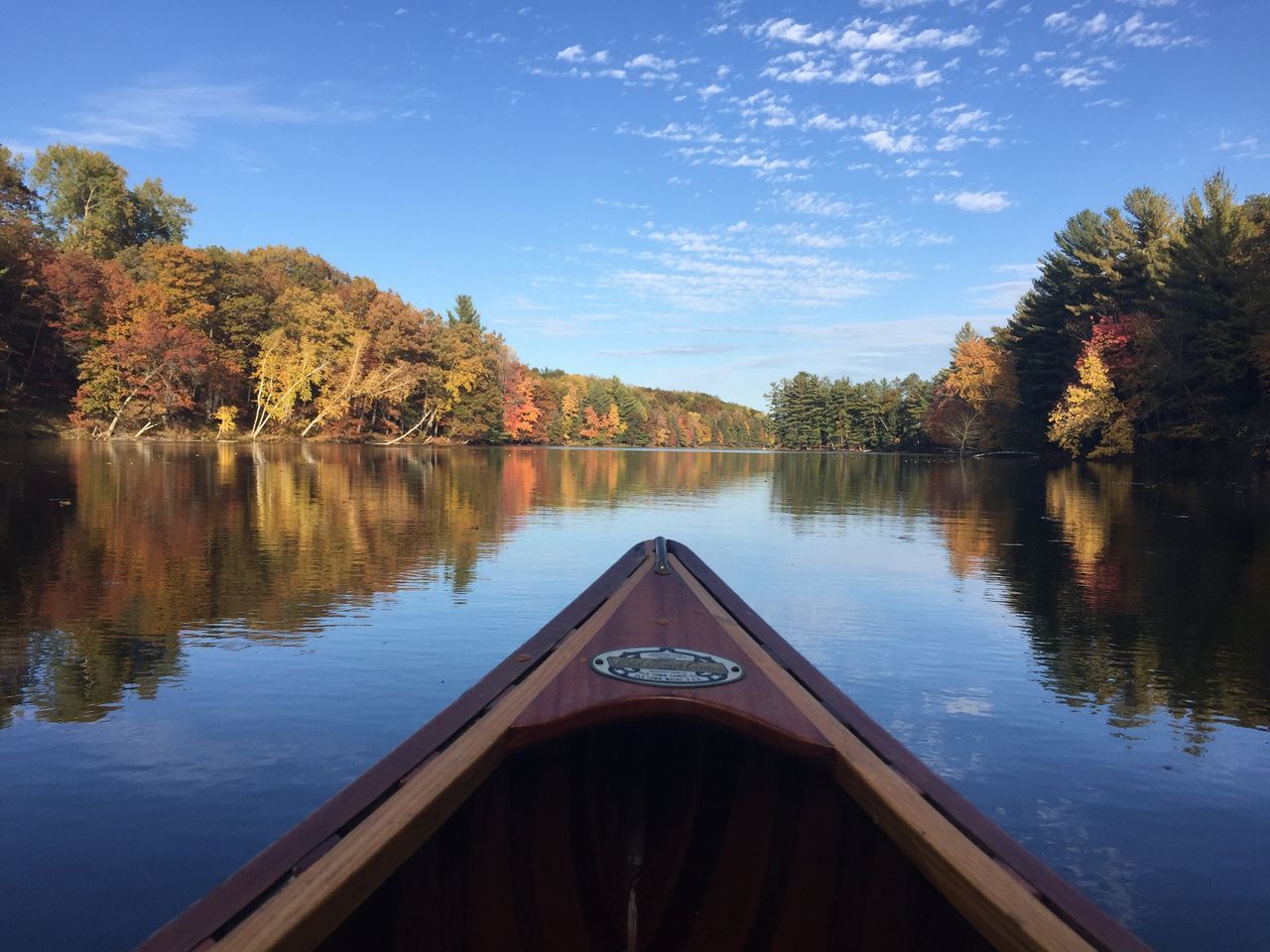 LAKE BY TREES AGAINST SKY