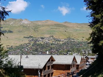 High angle view of buildings in city against sky