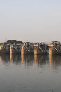 Bridge over river against clear sky