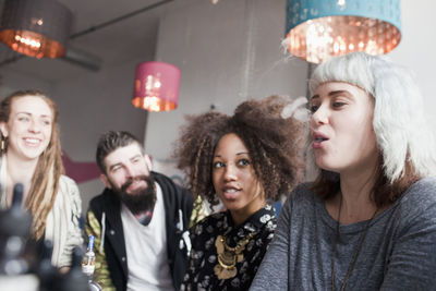 Young friends smoking