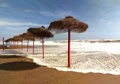 Scenic view of beach against sky