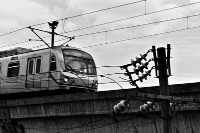 Low angle view of train against sky