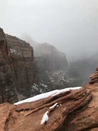 Scenic view of mountains against sky during winter