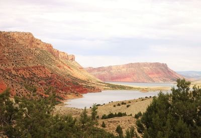 Rock formation at flaming gorge national recreation area against sky