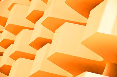 Full frame shot of patterned orange wall aß background 