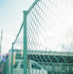 Chainlink fence against sky