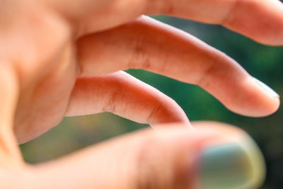 Close-up of cropped woman hand