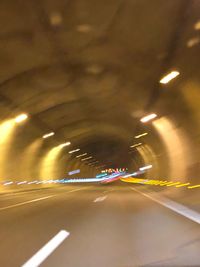 Light trails on road in tunnel