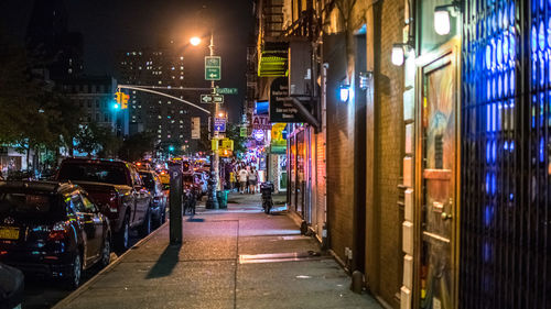 Illuminated street at night