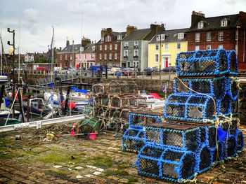 Stack of crab pots against built structures