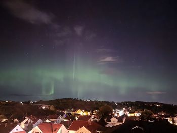High angle view of townscape against sky at night