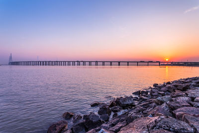 Scenic view of sea against sky during sunset