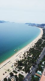 High angle view of swimming pool by sea against sky