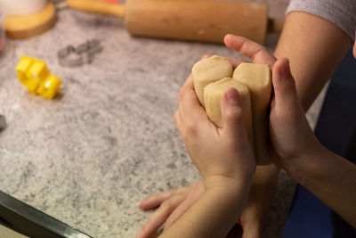 Midsection of woman preparing food on table