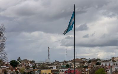 Low angle view of buildings and houses against sky