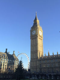 Low angle view of buildings against clear sky