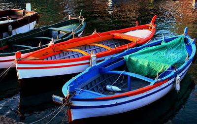 Boats moored in lake