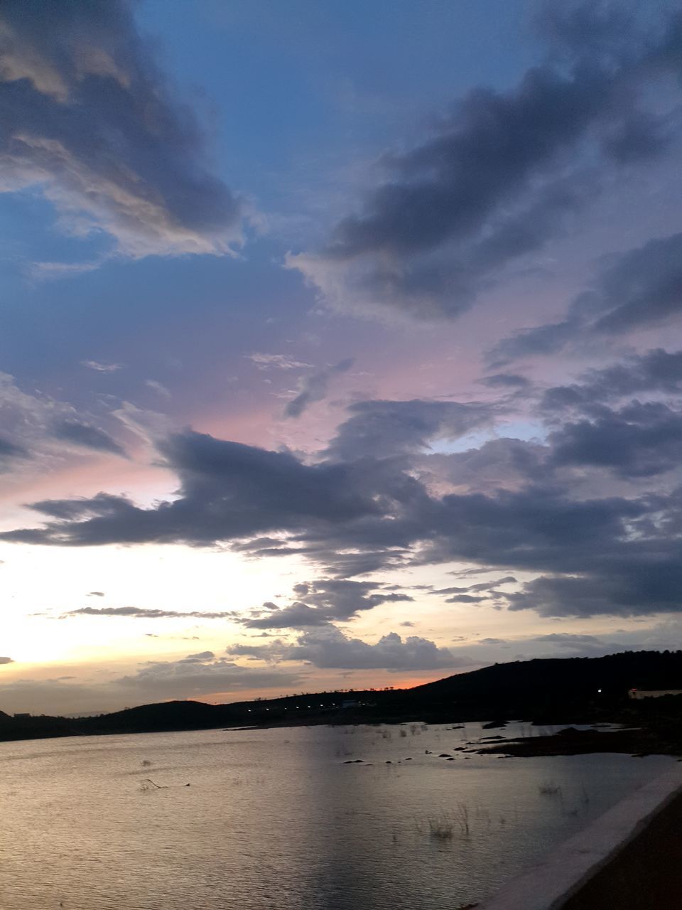 SCENIC VIEW OF SEA AGAINST ROMANTIC SKY