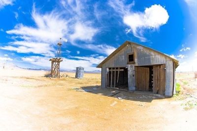 Built structure against cloudy sky