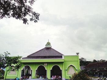 View of historic building against cloudy sky