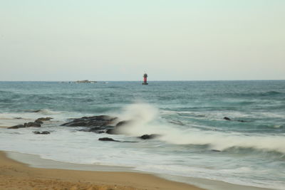 Scenic view of sea against clear sky