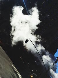 Low angle view of street light against sky