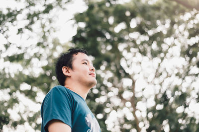 Portrait of boy against plants