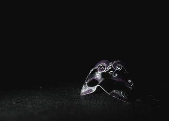 Close-up of object over black background