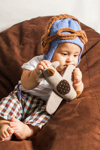 Cute baby boy wearing hat