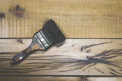 High angle view of paintbrushes on table