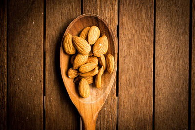 Almonds on a wooden table 