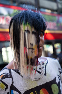 Portrait of woman with multi colored hair