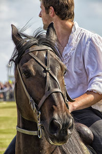 Man riding on horse