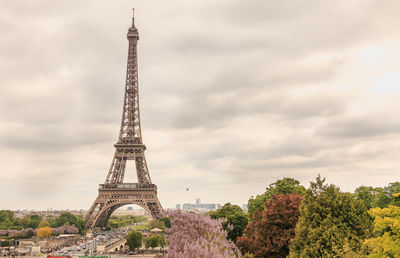 Tower against cloudy sky