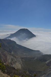 Scenic view of volcanic mountain against sky