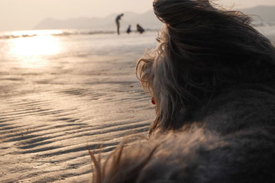 Woman looking at sunset