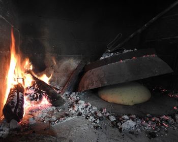 High angle view of bonfire on barbecue grill