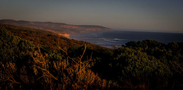 Scenic view of sea against sky during sunset