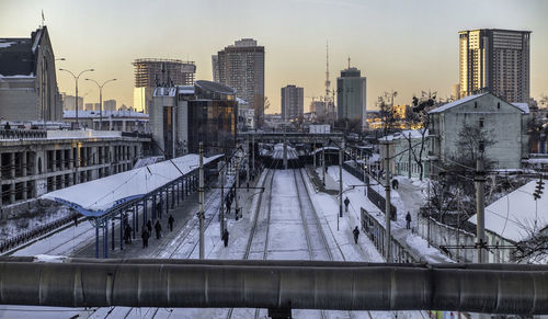 High angle view of buildings in city during winter