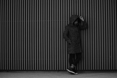 Woman standing on street