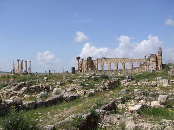 View of old ruins against blue sky