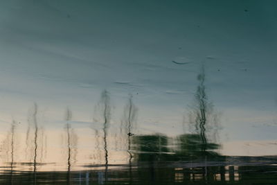 View of lake against sky during sunset