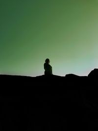 Low angle view of a silhouette of building