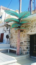 Low angle view of built structure against blue sky