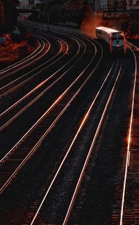 High angle view of railroad tracks at night