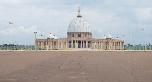 Church in city against sky