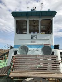 Low angle view of old abandoned ship against sky