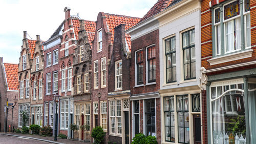 Low angle view of residential buildings against sky