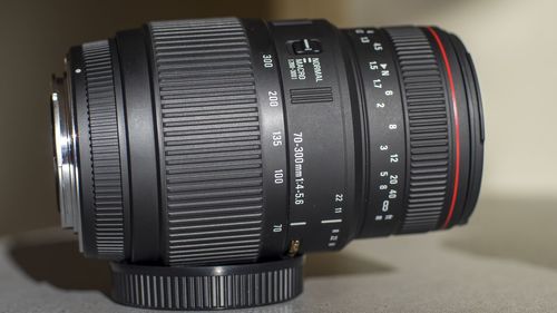 Close-up of camera lens on table